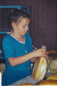 Anna Keefer puts bread into bags.